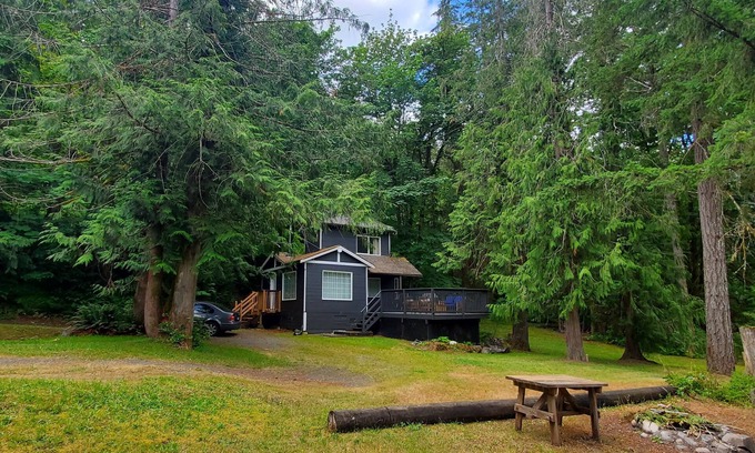 Duncan Cottage | Riverfront cottage with stairs to the river, firepit, and forested retreat.