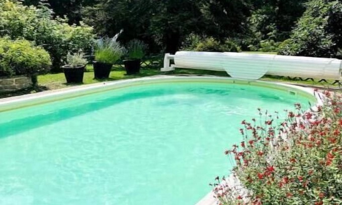Aulnay-la-Riviere House | Relaxing Riverfront Pool House in a Beautiful Park Setting