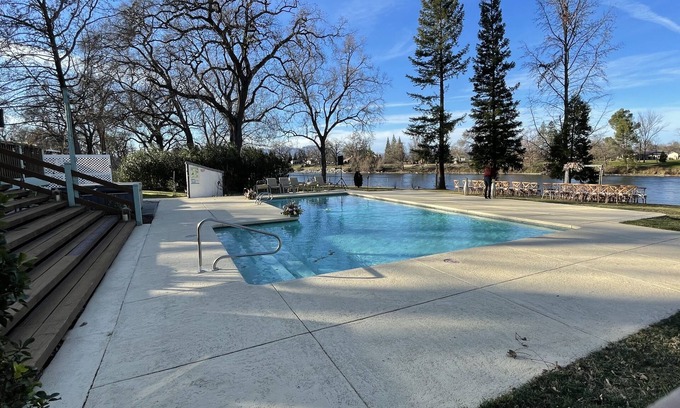 Cascade House | Riverhouse Retreat: Poolside Relaxation & Hot Tub Escape