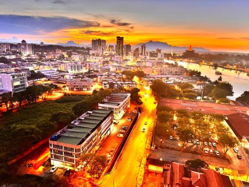 Kuching Apartment | Riverside High Floor Stay: Waterfront Views & Pool Access