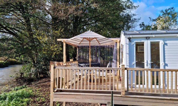 Oswestry Cabin | Riverside Cabin in Shropshire with Spa & Hot Tub
