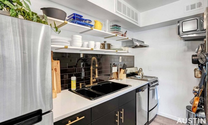 Riverside Condo | Riverside Gem for 4: Poolside Retreat with Free Parking