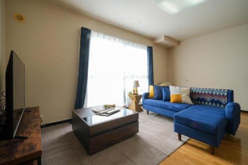 Shinhidaka Apartment | Cozy Riverside Mansion - Family-Friendly Vacation Retreat