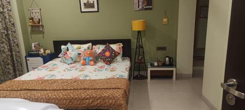 Sualkuchi House | Pet-Friendly Riverside Palm Room Near Kamakhya & IHR
