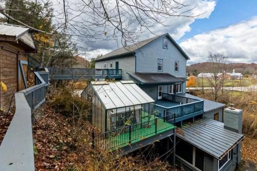 McDowell House | Riverside Retreat: Your Karaoke and Poolside Getaway