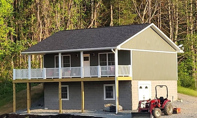 Independence House | Scenic RiverView Cabin with Hot Tub & Family-Friendly Amenities