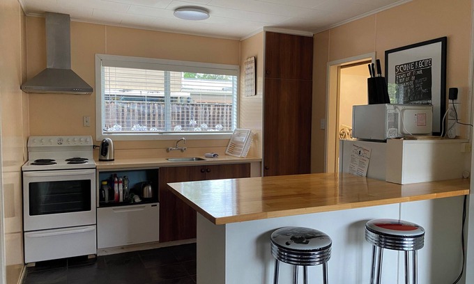 Turangi House | Riverway Lodge: Ideal for Families with Pet-Friendly Amenities