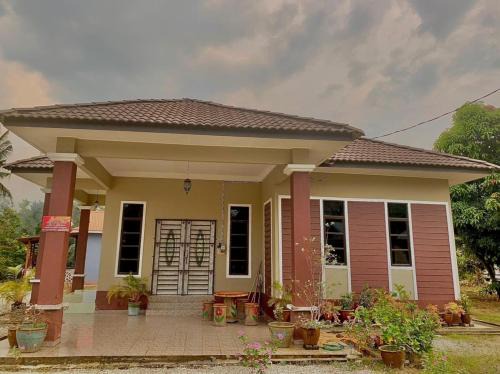 Binjai House | Discover RK Asiana Homestay: Family-Friendly Escape