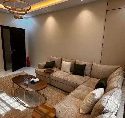 Jizan Apartment | Rkeen Residence 1- lounge and bedroom