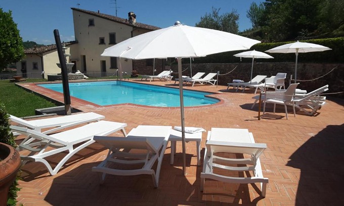 Tavarnuzze Apartment | Rocca Palazzaccio: Oceanfront Retreat with Pool & High Ratings