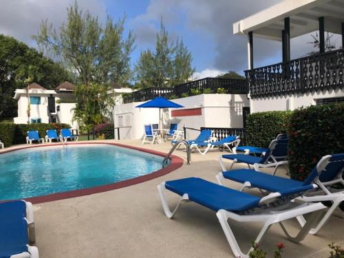 Rockley Apartment | Relax at Rockley Golf Club: Pool, Spa & Oceanfront Views