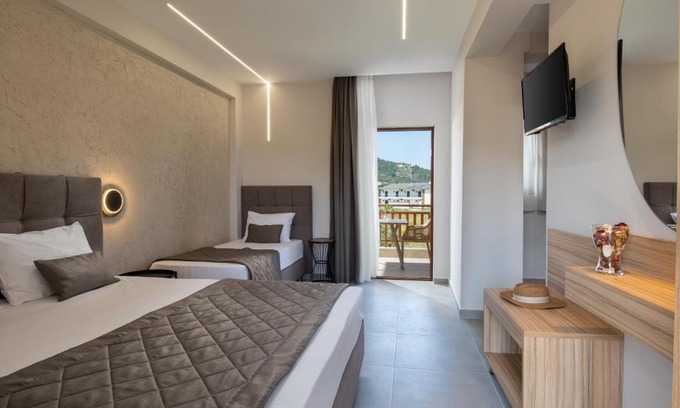 Sarti Apartment | Beachfront Bliss at Rodon Garden 2 - Rated 9.5/10!