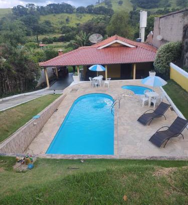 Socorro House | Rodrigo Valdez Correa: Family-Friendly Retreat with Pool
