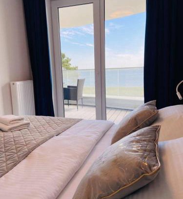 Trzebiatow Apartment | Premier Oceanfront Rogowo Pearl Apartment with Pool