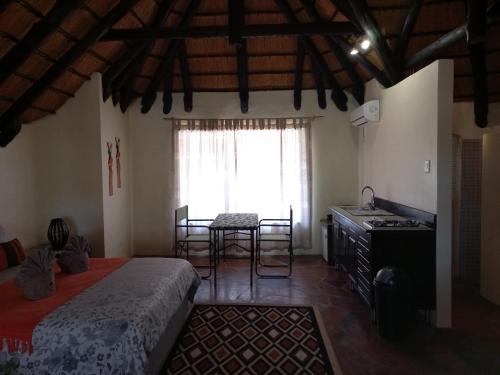 Omaruru Cabin | Roidina Safari Lodge: Family-Friendly with Pool & Breakfast