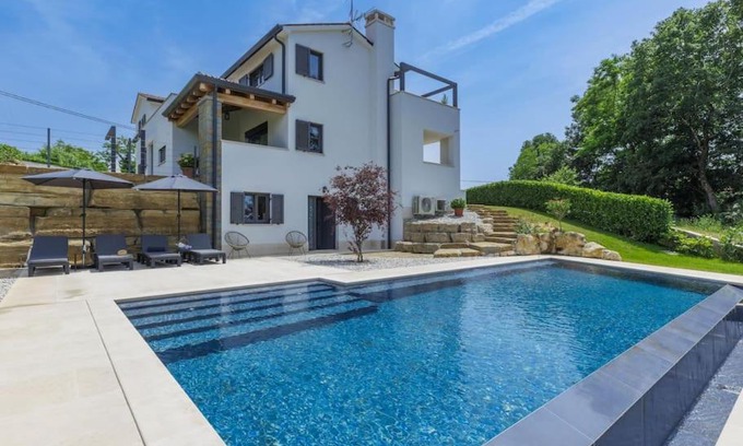 Karojba Apartment | Experience Rokvilla: 4-Star Oceanfront Oasis with Pool