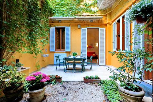Rione V Ponte Apartment | Relaxing Retreat at ROMAC Coronari with Gym and Garden