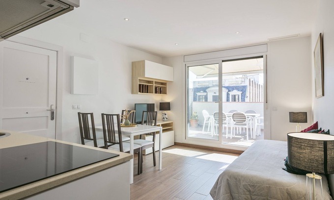 Sant Antoni Apartment | Elegant Penthouse with Terrace in Central Barcelona