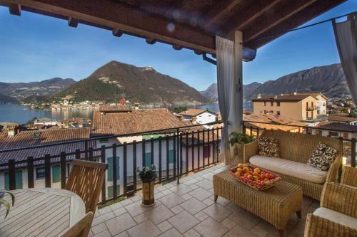 Sulzano Apartment | Serene Lake View Retreat with Pool and Hot Tub Amenities
