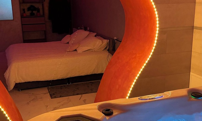 Luxeuil-les-Bains Apartment | Romantic loft in the heart of Luxeuil's historic town center with jacuzzi.