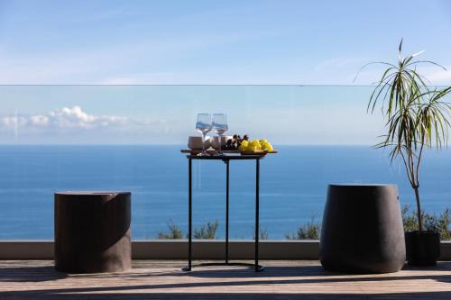New Lynn House | Oceanfront Romantic Piha: 5-Star Getaway with Ocean Views
