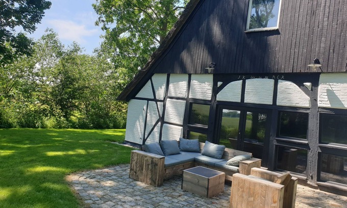 Dorum House | Romantic Thatched-Roof Retreat with Spa and Ocean Views