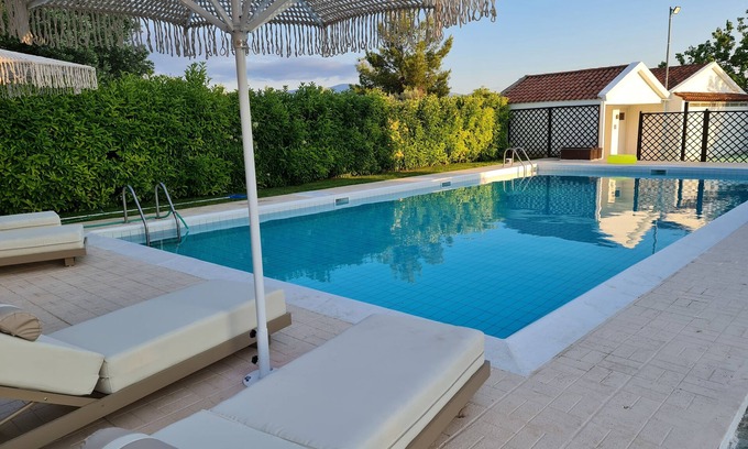 Oropos Villa | Enchanting Villa with Garden, Pool & Basketball Court