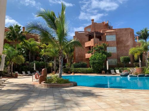 Palm-Mar Apartment | Relax at Bahia de los Menceyes with Heated Pools & Ocean Views