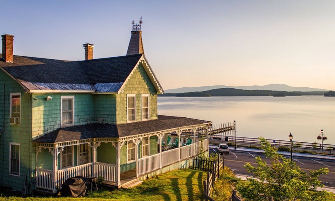 Weirs Beach House | Idyllic Romeo's Balcony: Oceanfront Retreat at Weirs Beach