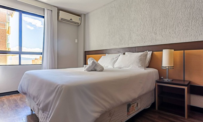 Centro Apartment | Rooftop Pool with Scenic Sea and Bridge Views Await
