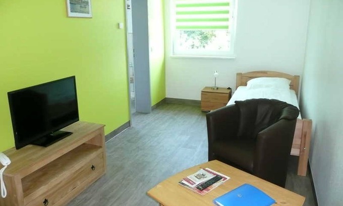 Nordliche Muhlenvorstadt House | Exceptional Room 3 at Pension Moment - Family Friendly Stay