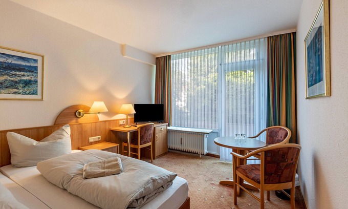 Bad Sachsa Apartment | Comfortable Aparthotel Am Stadtpark with Wi-Fi & Spa
