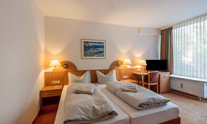 Bad Sachsa Apartment | Modern Room at Aparthotel Am Stadtpark with Free Wi-Fi