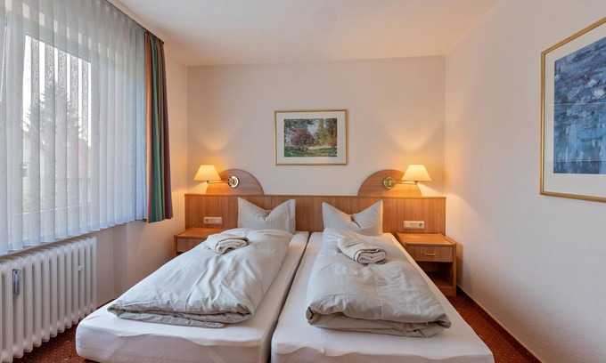 Bad Sachsa Apartment | Comfortable Aparthotel Am Stadtpark with Wi-Fi & Spa