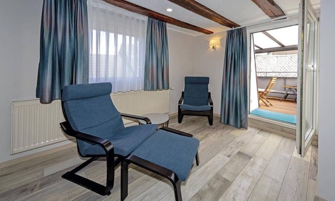 Rhens Apartment | Comfortable Room Hunsrück with Family and Pet-Friendly Perks