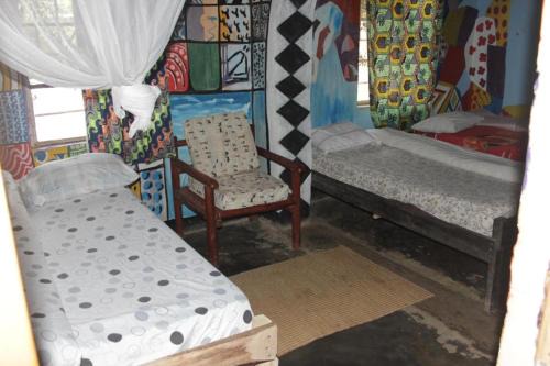 Nyakinama House | Comfortable Triple Room at Red Rocks Rwanda - Family-Friendly