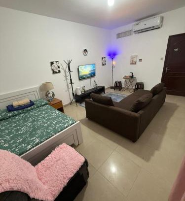 Madinat Zayed House | Room with toilet and tv for couple