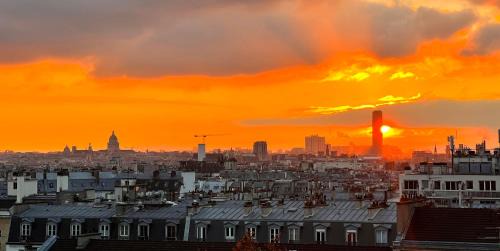 Quartier de la Folie-Mericourt House | Rooms with Spectacular Views Over Parisian Rooftops