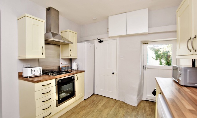 Cark Cottage | Pet-Friendly Rose Dene Cottage near Stately Home & Gardens