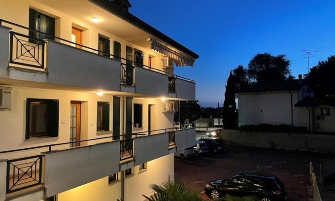 Ronchi dei Legionari Apartment | Rose e Frutta: Renovated Retreat with Parking & Family Perks
