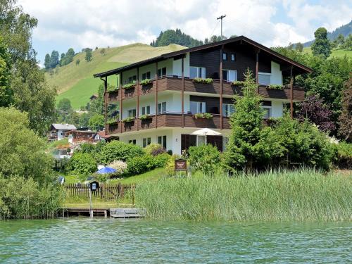 Kufstein Apartment | Experience Oceanfront Bliss at Rosenhof am See Ferienwohnung