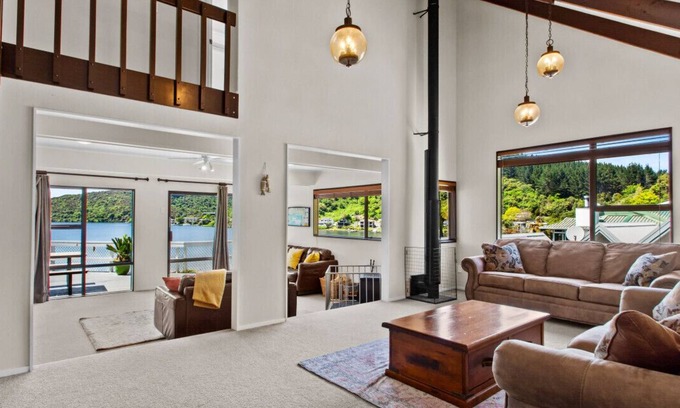Rotorua House | Idyllic Rotoiti Bay Retreat with Lake Views & Family Amenities