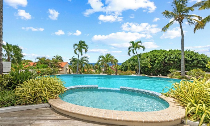 Piscadera Villa | Royal Beach House with sea view and large community pool.