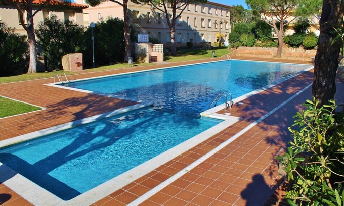 Palamos Apartment | Inviting Royal GE-AP: Beachfront Stay with Pool & Spa