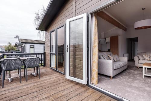 Harlow Ski Chalet | Family-Friendly Roydon Marina Village Lodges with Dining Options