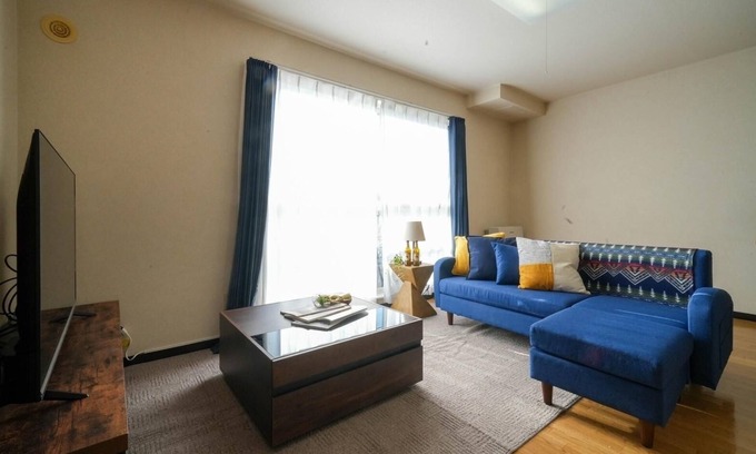 Shinhidaka Apartment | Experience Riverside Mansion with Breakfast & Parking Included