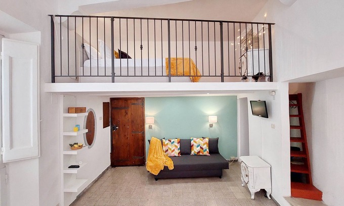 Rione VII Regola Apartment | Pet-Friendly Getaway: Field of Flowers Apartment Awaits