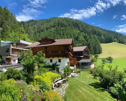 Matrei in Osttirol Apartment | Oceanfront Ruggenthalerhof: 4-Star Retreat with Spa