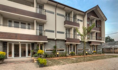 Ragunan Hotel | Discover Comfort at Rumah Kamang Residence with Family Amenities