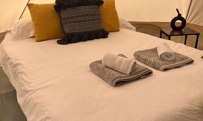 Dwyran RV Rental | Rustic Glamping Stay in a Cozy 6m Bell Tent